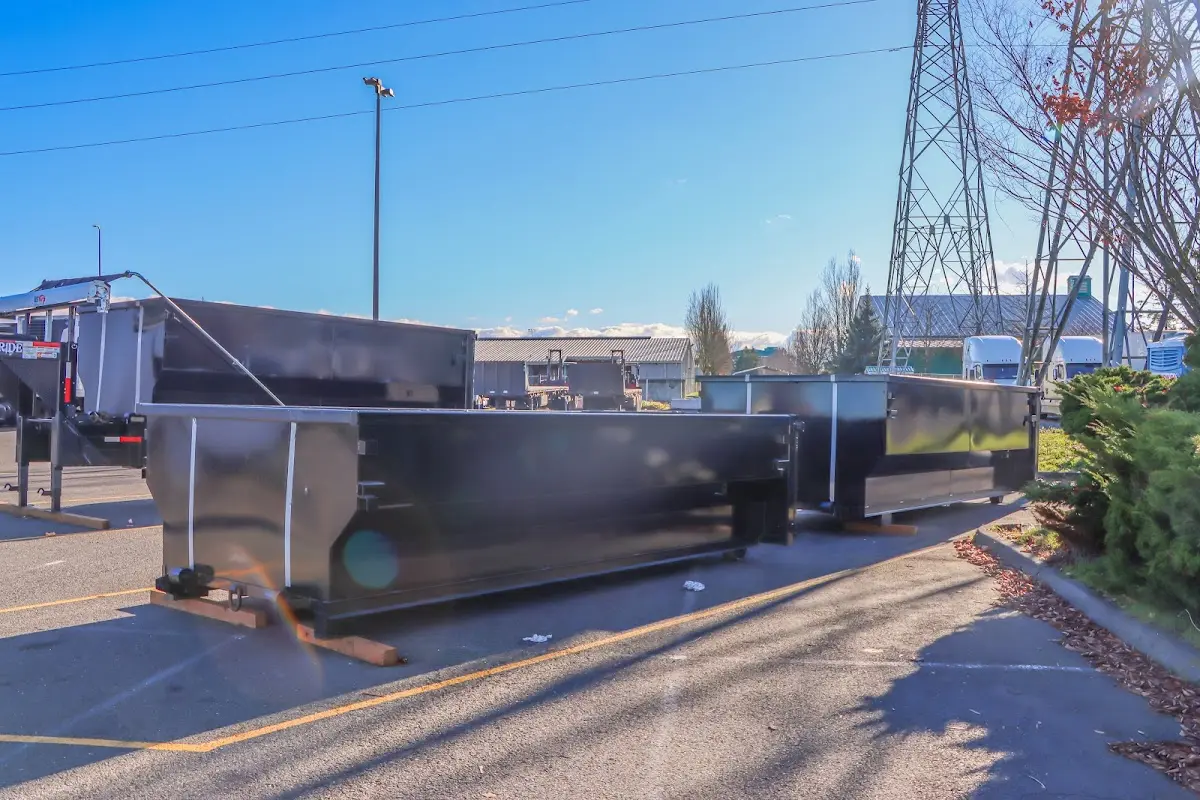 Roll-off dumpster ready for waste disposal at job site for 3 Yard Dumpster Rental in Woodstock